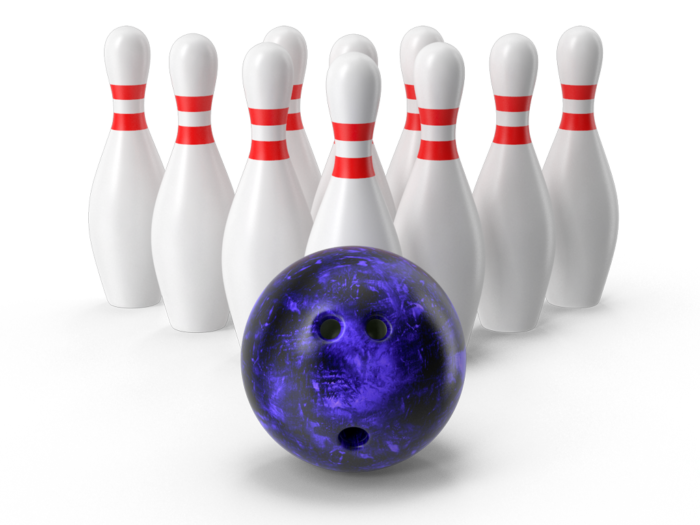 Blue bowling ball in front of bowling ball pins